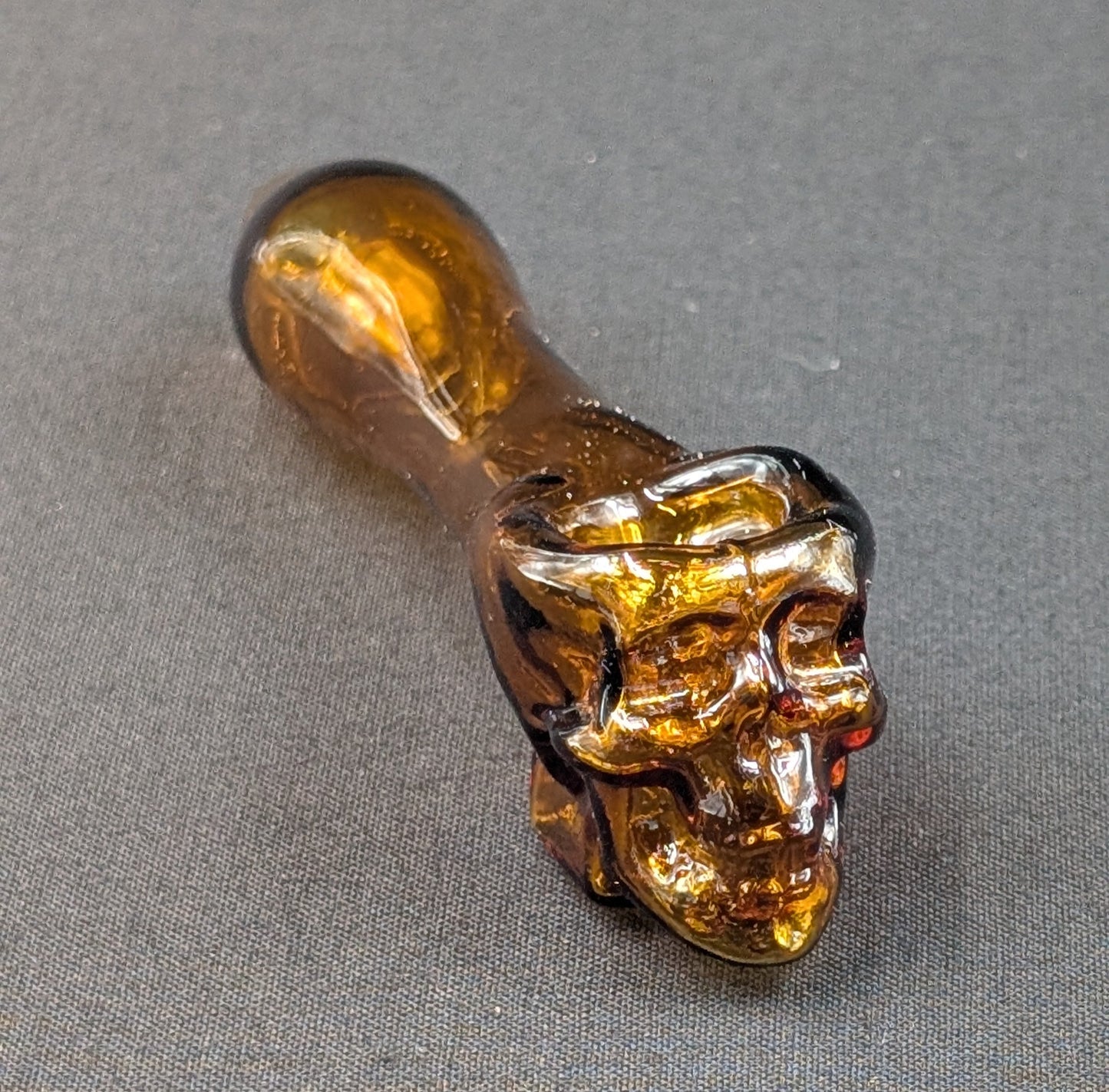 4" Glass Spoon Skull Amber